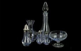 Collection of Caithness Glass, comprising a 12'' tall decanter with stopper, a small 10'' water jug,
