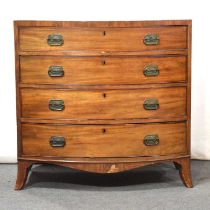 George III mahogany bowfront chest of drawers and a toilet mirror,