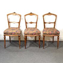 Set of six Victorian walnut and amboyna salon chairs,