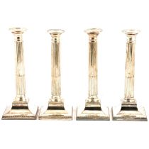 Set of four silver-plated candlesticks, and a spirit kettle,
