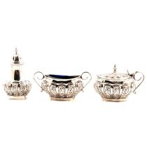 A silver three piece condiment set, Walker & Hall, Sheffield 1900/1901.