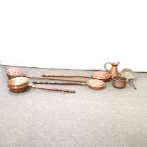 Four copper bed pans, two cooking pots and a small jug,