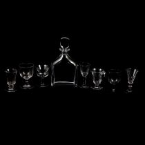 Orrefors decanter, champagne flutes and other clear glasses.