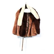 Fur coat; fur stoles, jacket, lined parasol, cane and an evening bag.