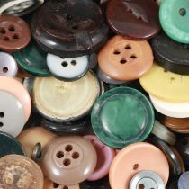Small quantity of vintage buttons.