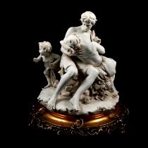 Figural group of a pair of lovers with Cupid
