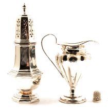 Georgian style silver sugar sifter, silver cream jug, and a thimble.