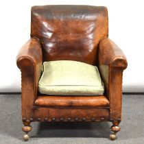 1940's brown leather upholstered easy chair,