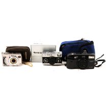 Rollei 35 camera, Sony DSC-W5 Cyber-shot camera, and Minolta Panorama Zoom 28 camera.