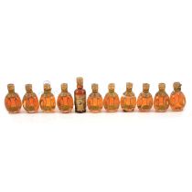 Eighteen miniature bottles of Haig Dimple whisky, 1950s/1960