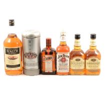 Seven bottles of assorted whisky, including Jura 10 year old, and a bottle of Cointreau