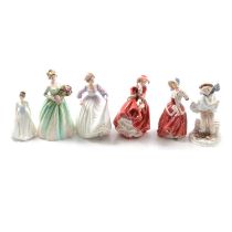 Nine Royal Doulton, Coalport and other figurines.