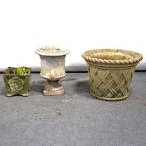 Haddonstone 'Tudor' jardiniere, a classic urn planter, and another