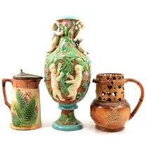 Continental majolica vase, majolica jug and a Derby stoneware puzzle jug,