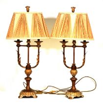 Pair of brass and composition table lamps,