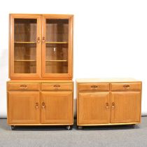 Two elm sideboard units and glazed bookcase, by Ercol