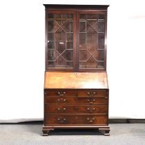 George III mahogany bureau bookcase, matched,