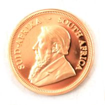 A 2014 Krugerrand 1/4oz Gold Proof Coin.