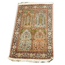Kashmir silk rug, and a Bokhara rug