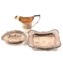 Silver cream jug and two dishes,