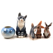 Eight Royal Copenhagen animal figurines and two small vases.