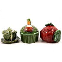 Collection of Portuguese vegetable-themed tureens, pot, dish and lidded duck basket.