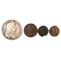 Two Charles II coins and two Roman coins.