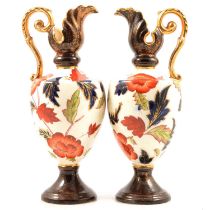 Pair of Victorian pottery ewers.