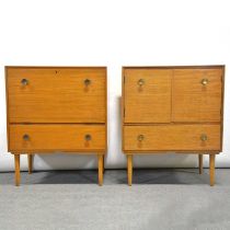 English Mid-Century teak cocktail cabinet and a similar cabinet
