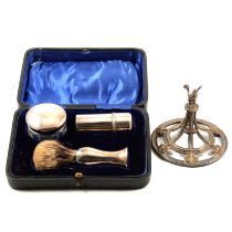 Silver shaving set and a silver lid,