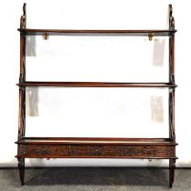 Set of mahogany open wall shelves in the Chippendale style,