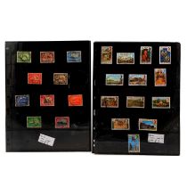 Stamp Catalogues; stamp themed trade cards, etc