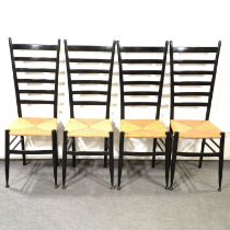 Set of six ebonised ladderback dining chairs, and an ebonised dining table