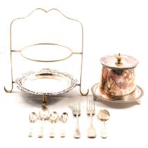 A collection of silver spoons and silver-plated items.