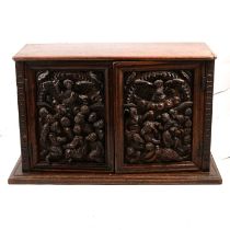 Victorian carved oak small cupboard, and a barometer