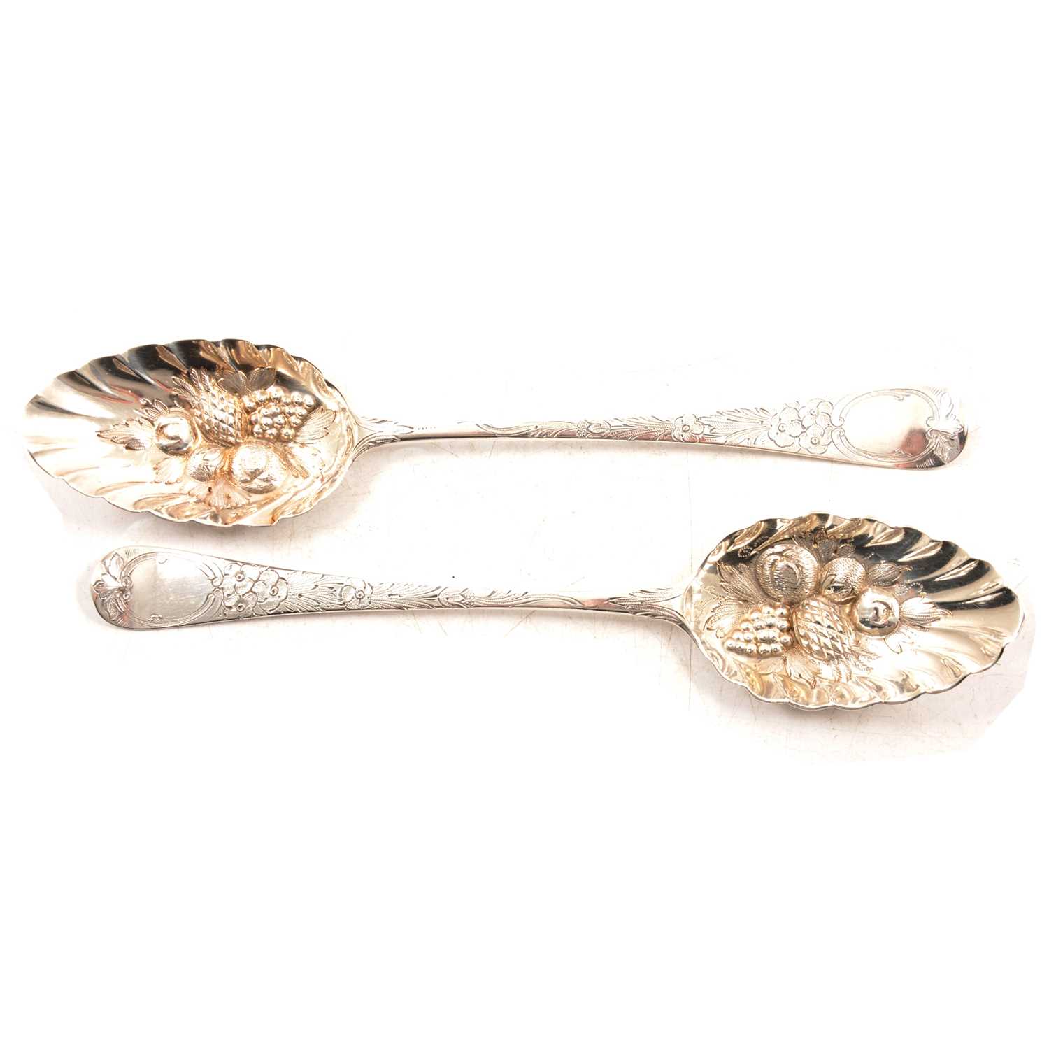 Matched pair of Georgian silver berry spoons, William Eley I & William Fearn, London 1803 and 1804.