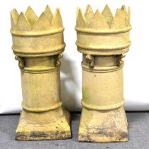 Pair of terracotta castle top chimney pots, height 82cm.