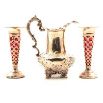 Victorian silver cream jug, and a pair of silver spill vases, cranberry glass liners
