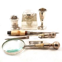 A silver matchbox holder, inkwell, plated wares, magnifying glass etc