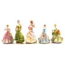 Five decorative ceramic figurines