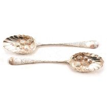 Two Georgian silver berry spoons, indistinct maker's marks, London 1799 and 1805.