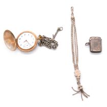 A gold-plated full hunter pocket watch, silver and white metal watch chains, and a vesta.