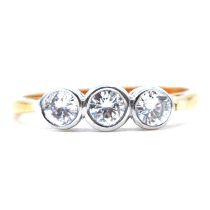 A diamond three stone ring.