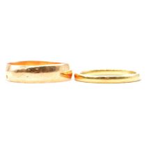 Two 18 carat yellow gold wedding bands.