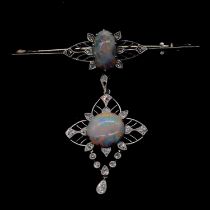 An opal and diamond brooch with pendant drop.