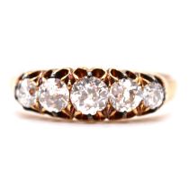 A diamond five stone ring.