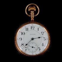 Waltham - a yellow metal open face pocket watch.