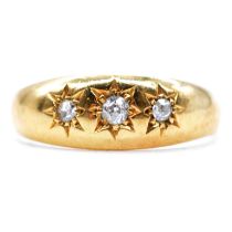 A diamond star gypsy set ring.