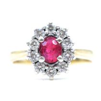 A ruby and diamond cluster ring.