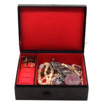 A jewel box with vintage gold and costume jewellery, and a thread count magnifier.